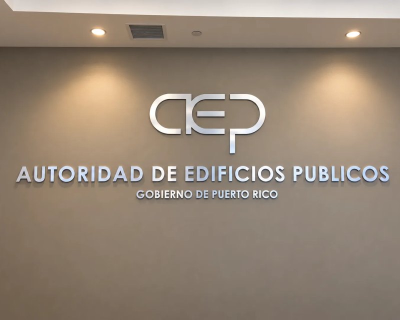 Public Buildings Authority logo and name in silver letters on the lobby wall