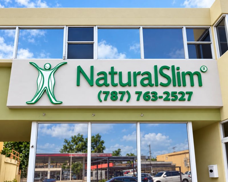 Green NaturalSlim dimensional letters and phone number on the storefront
